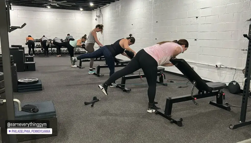 People exercising in a class at Earn Everything Gym